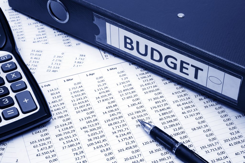 budget graphic - spreadsheet, calculator and folder