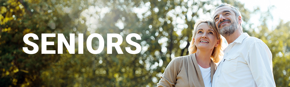 Senior Caucasian couple hugging in park. Family with a happy smile feels relaxed with nature in the morning. Or in the evening. Enter  elderly society And retire from work. Concept health insurance